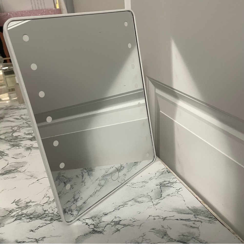 Small vanity mirror with lights